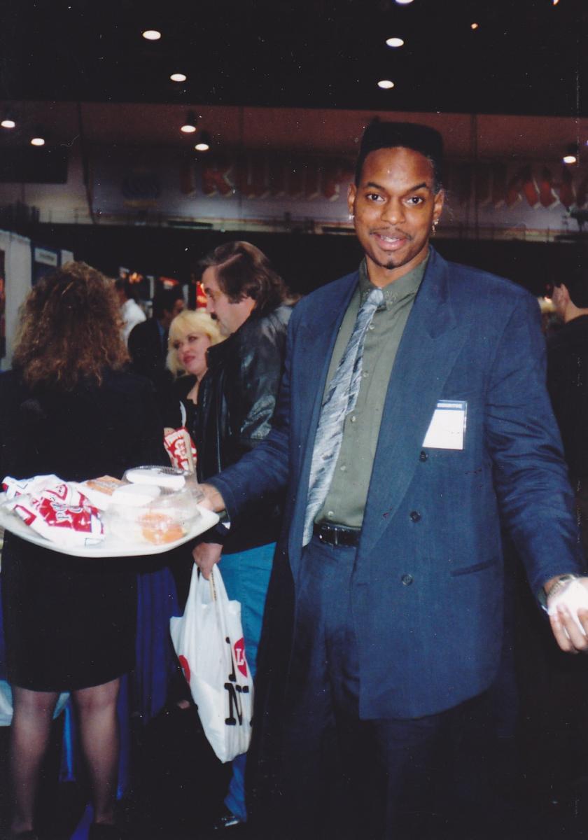 Ron Hightower bulks up during an erotic video convention.