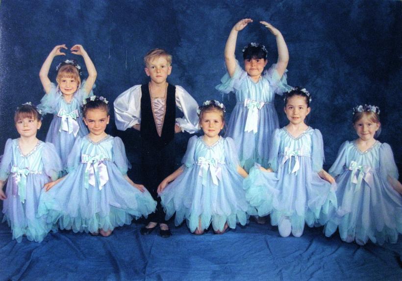 Writer at six years old, photographed at a local ballet school