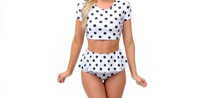 via <a href="http://www.unique-vintage.com/black-white-polka-dot-ruffled-crop-top-two-piece-swimsuit.html">Unique Vintage</a>