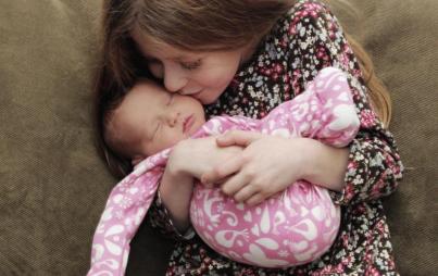 My oldest holding our surprise (photo: Allison Dickie)