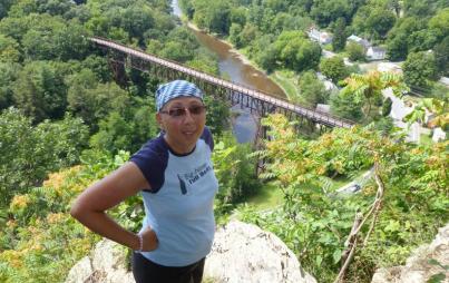 Atop Joppenbergh Mountain in New York, channeling Rosie the Riveter's fierceness